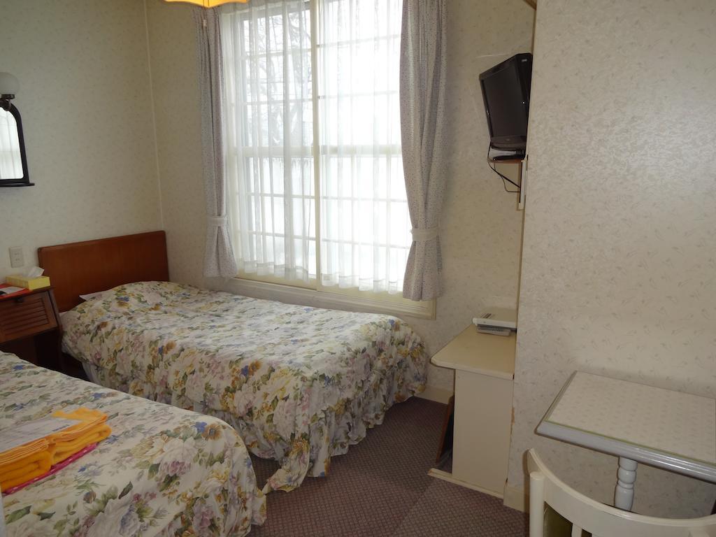 Ishiuchi Pension Bruges Minamiuonuma Rum bild