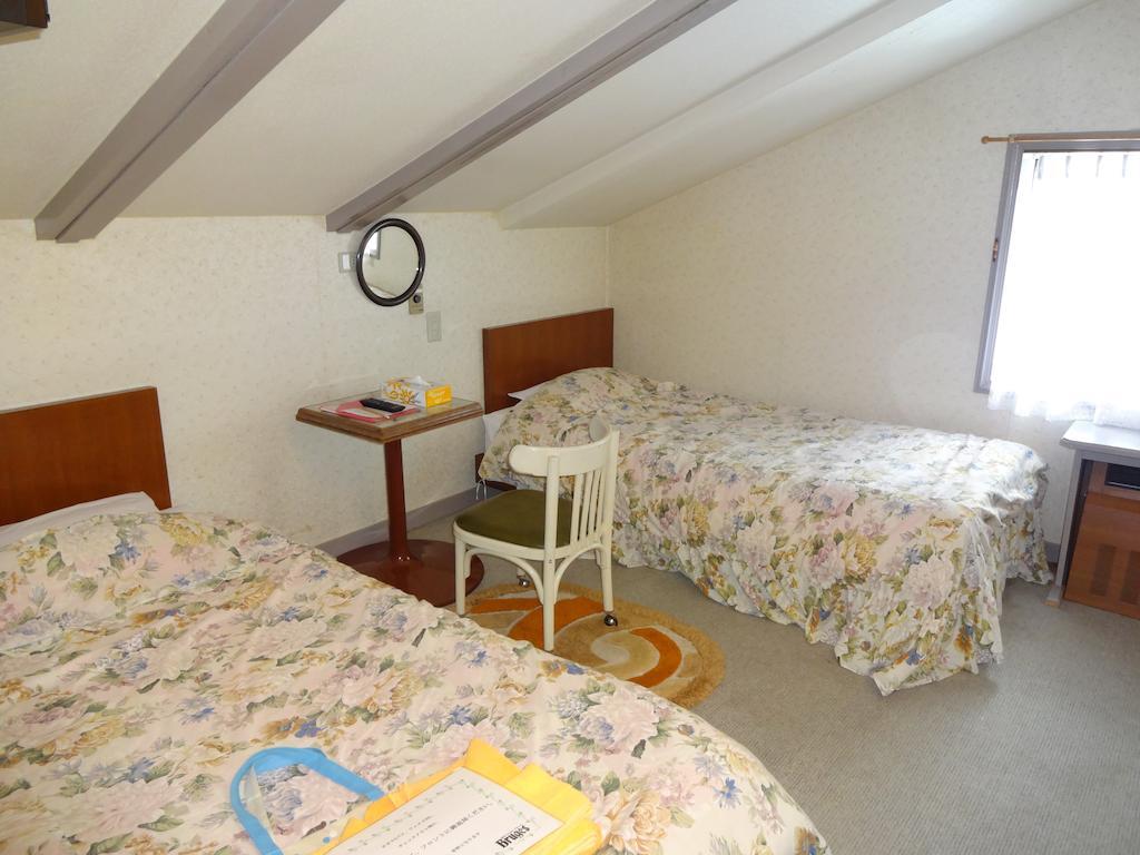 Ishiuchi Pension Bruges Minamiuonuma Rum bild