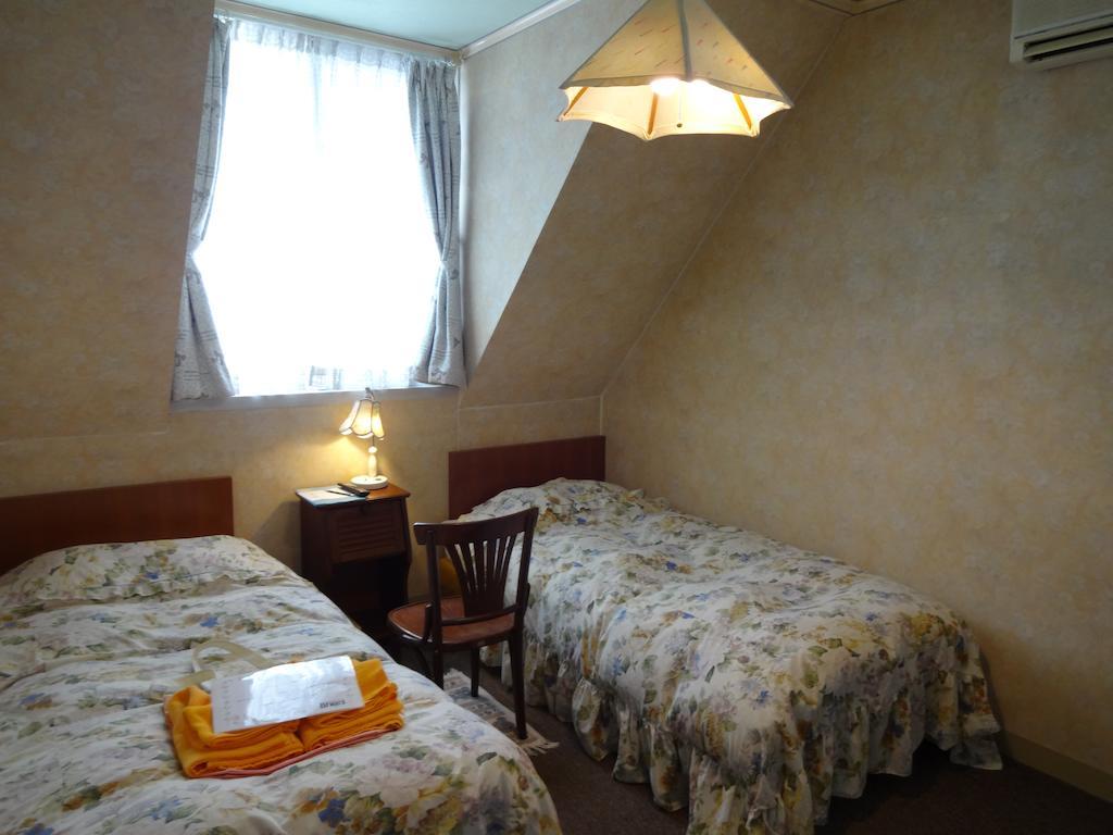 Ishiuchi Pension Bruges Minamiuonuma Rum bild