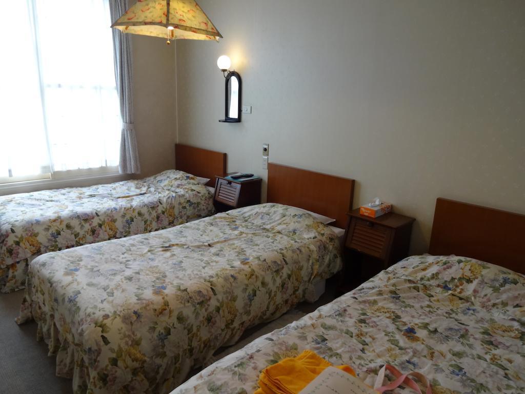 Ishiuchi Pension Bruges Minamiuonuma Rum bild